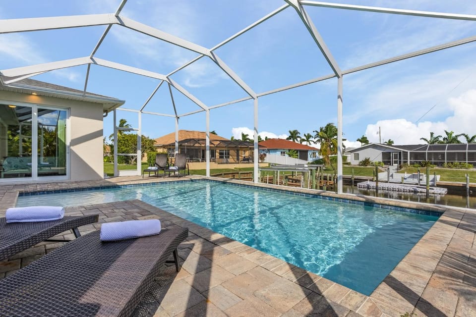 Minutes to the River!, Dock and Pool - Villa Gold Coast - Roelens Vacations House in Cape Coral