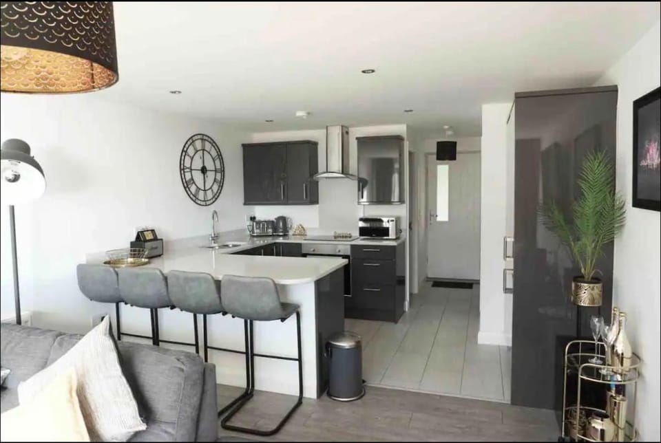 Kitchen or kitchenette, Dining area, dishwasher, stove, toaster