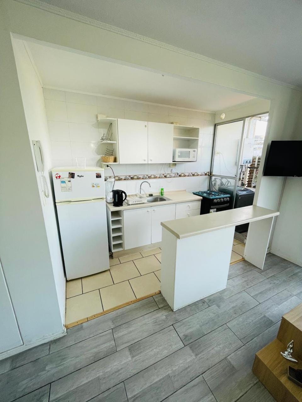Kitchen or kitchenette, oven, toaster