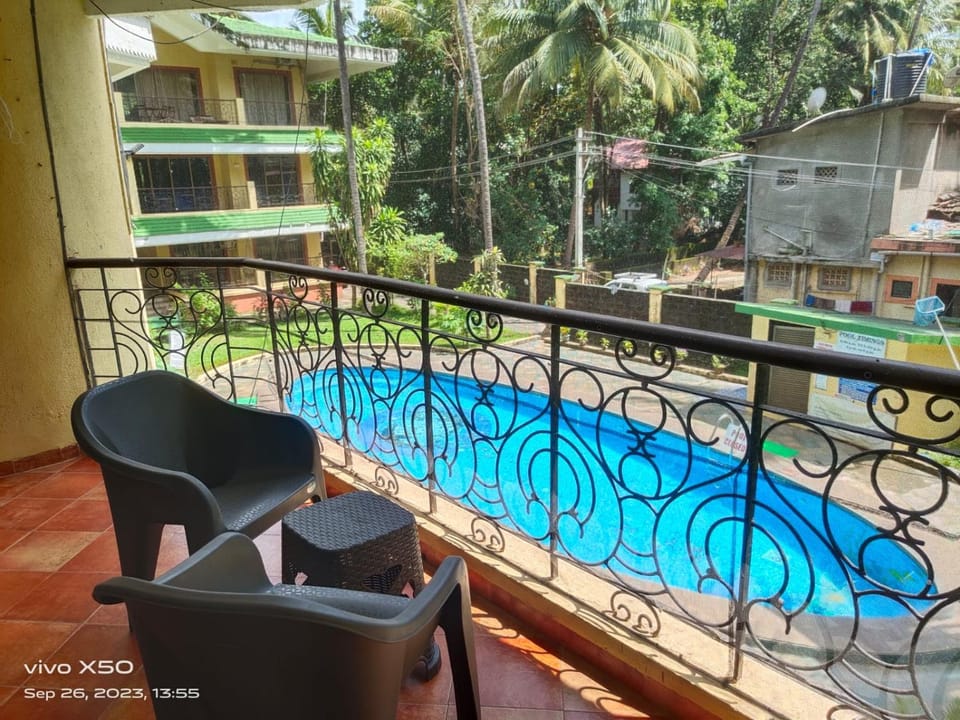 Property building, Day, View (from property/room), Balcony/Terrace, Pool view, Swimming pool
