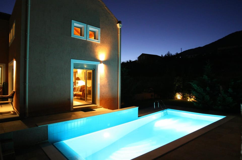 Property building, Night, Pool view, Swimming pool