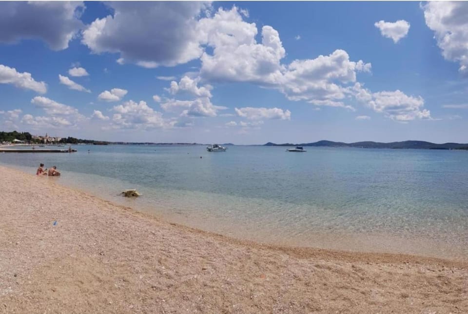 Nearby landmark, Day, Natural landscape, Beach