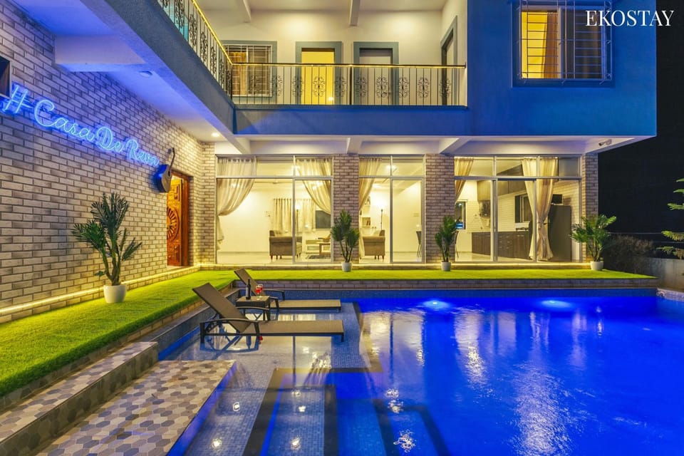Property building, Patio, Night, Pool view, Swimming pool, sunbed