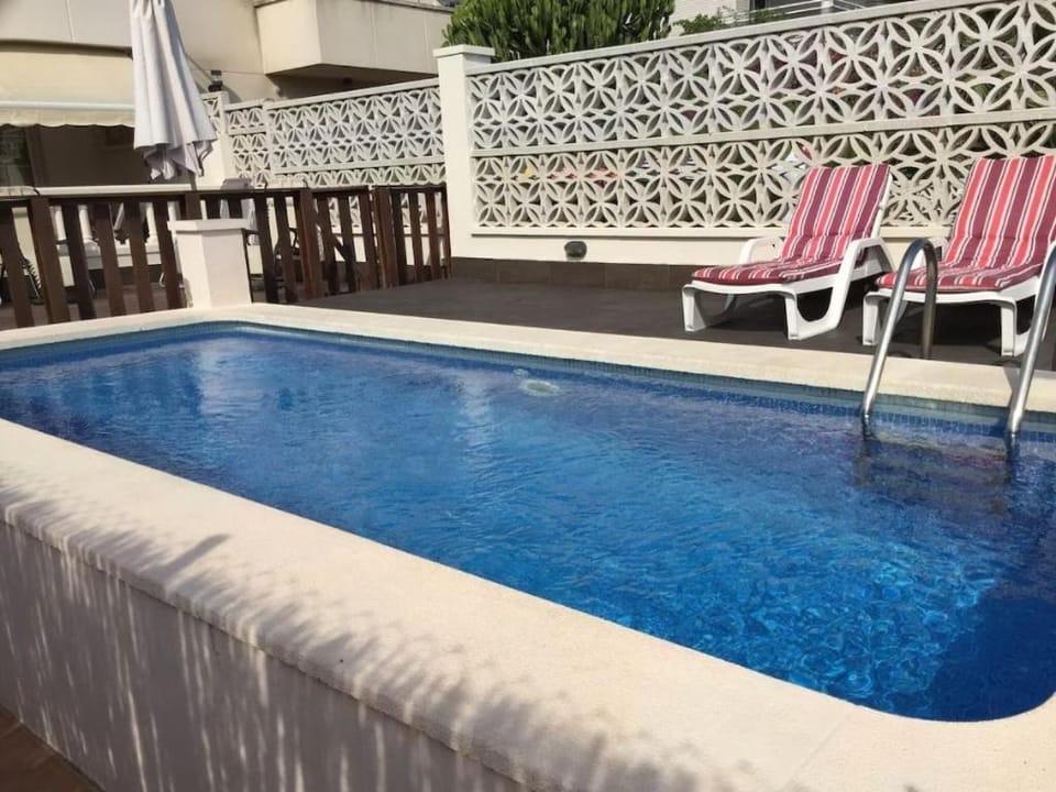 Property building, Living room, Swimming pool