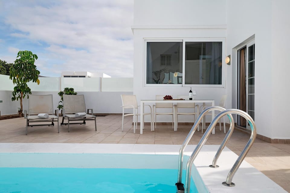 Property building, Living room, Swimming pool