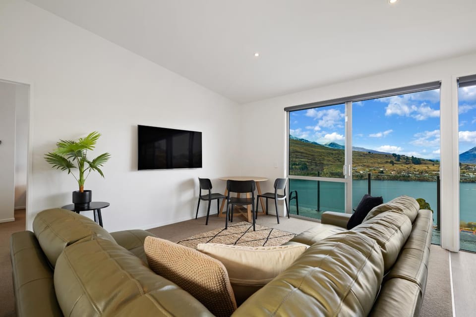 Natural landscape, TV and multimedia, Living room, Seating area, Lake view, Mountain view