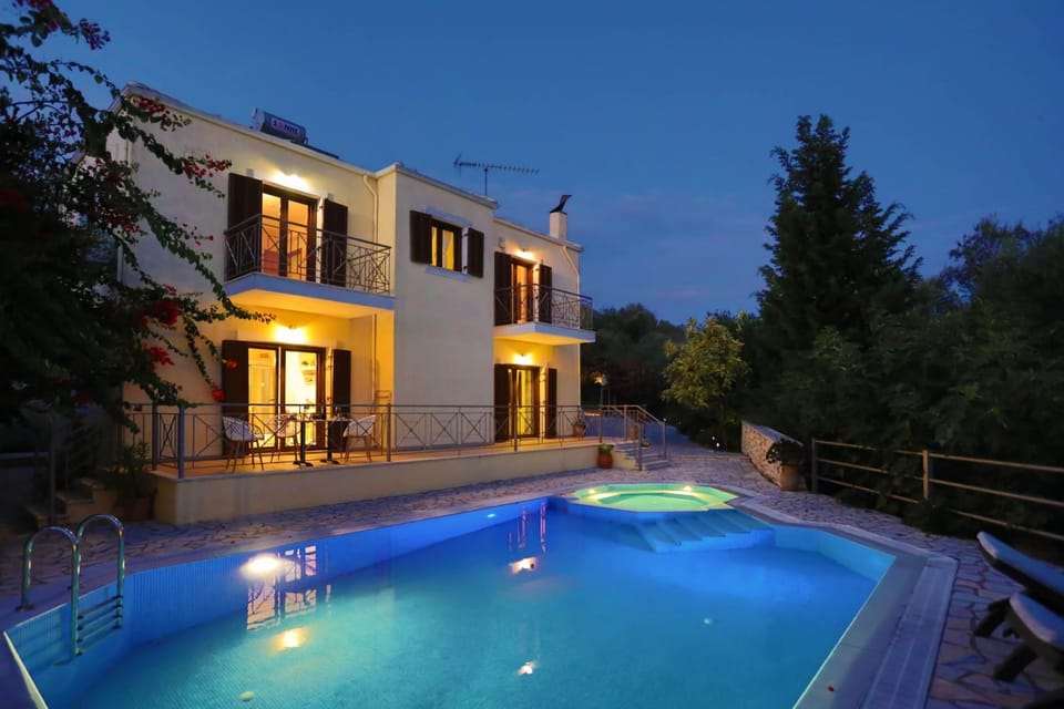Property building, Patio, Night, Pool view, Swimming pool, sunbed