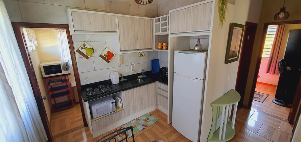 Kitchen or kitchenette, microwave, stove