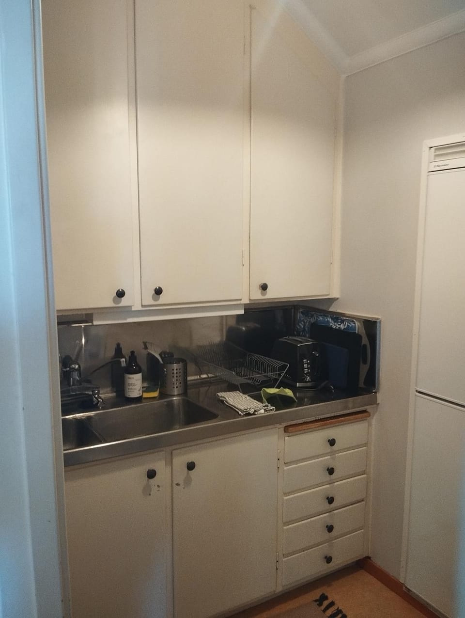 Kitchen or kitchenette, toaster