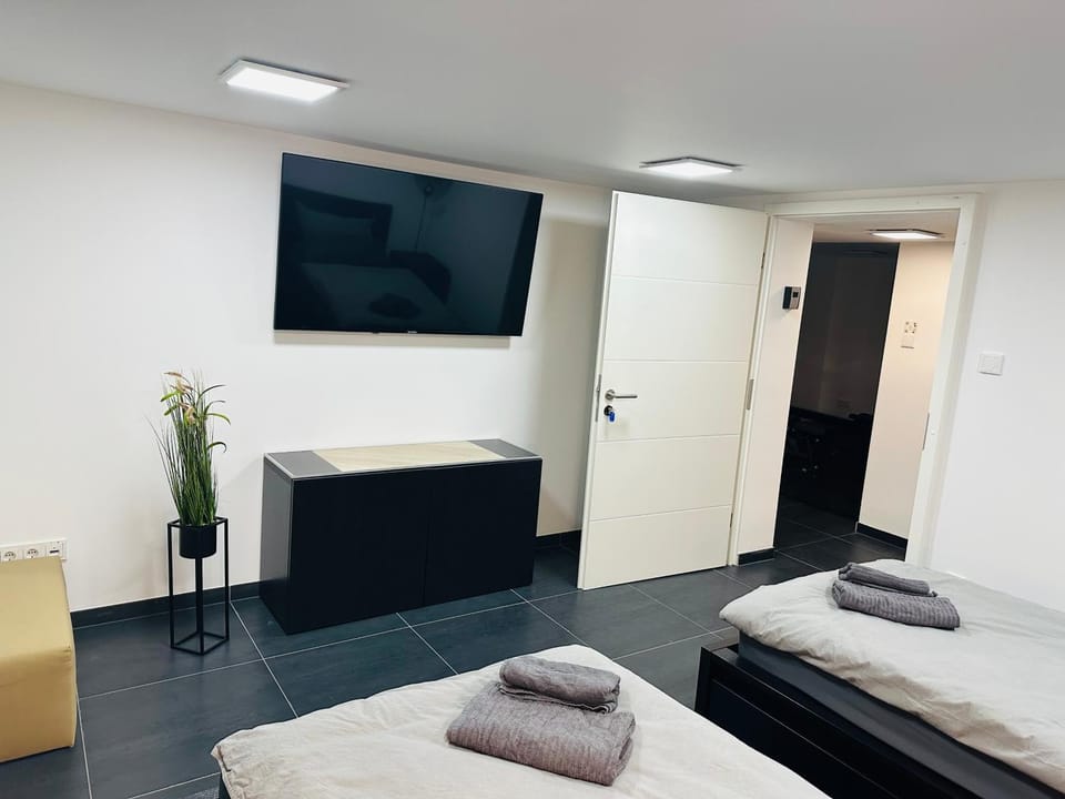 Bed, TV and multimedia, Bedroom, towels, wardrobe