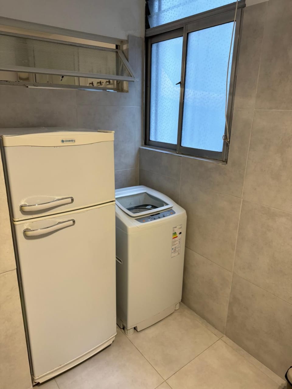 Kitchen or kitchenette, washing machine