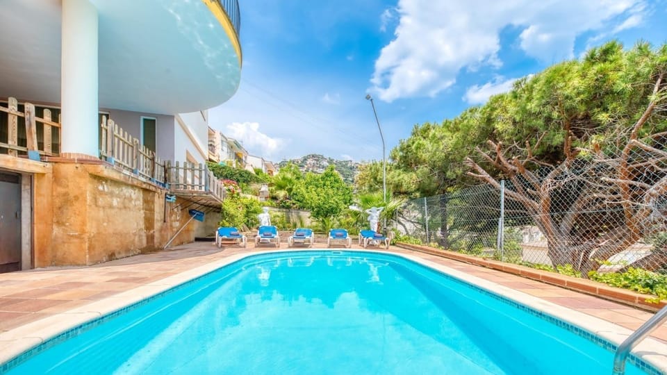 Property building, Living room, Swimming pool
