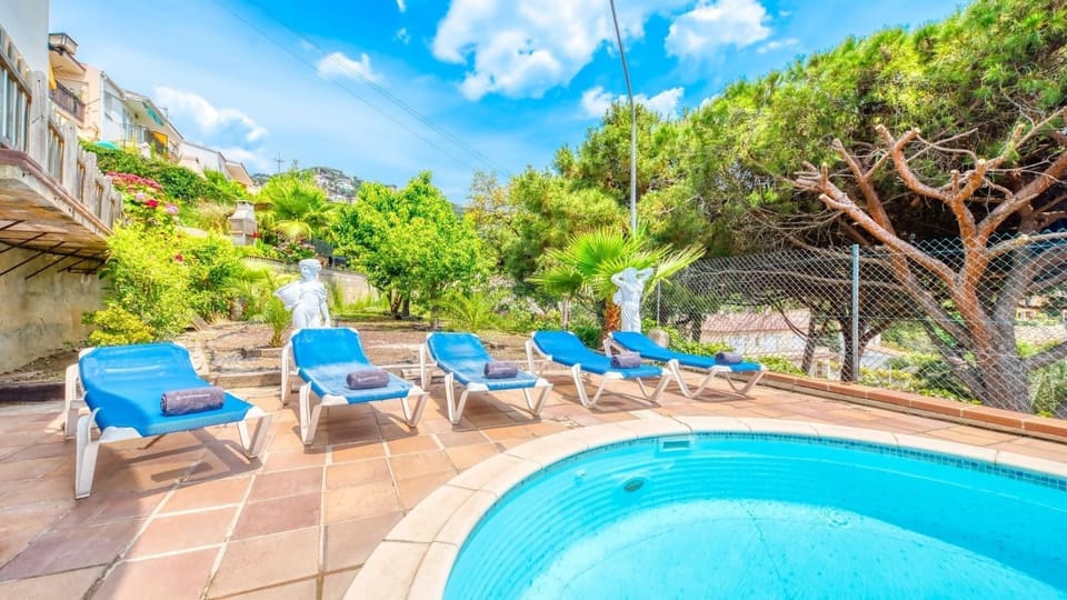 Property building, Living room, Swimming pool