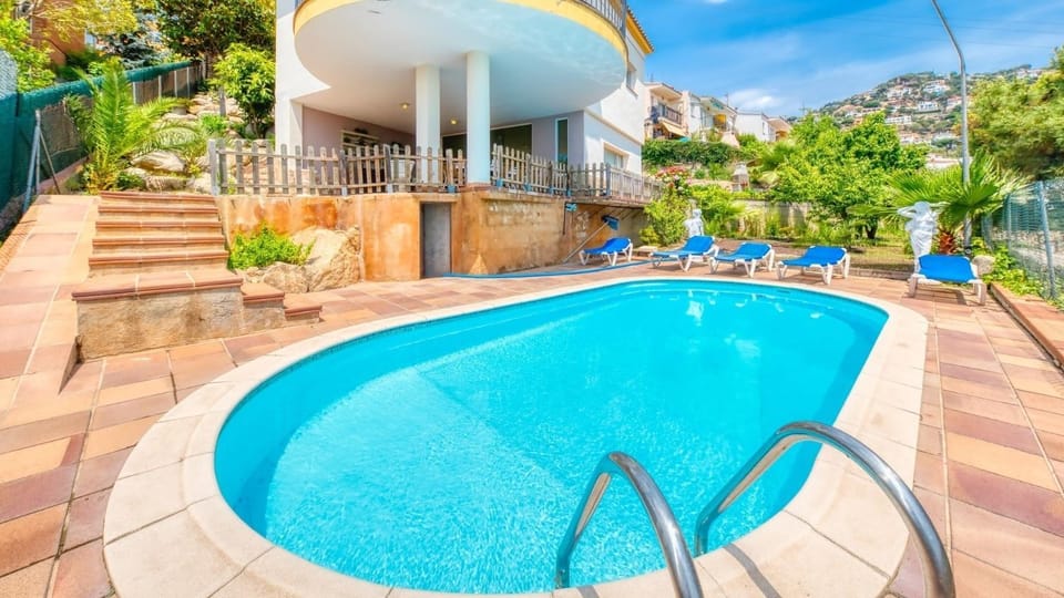 Property building, Living room, Swimming pool