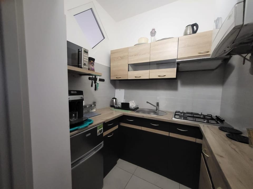 Kitchen or kitchenette, stove