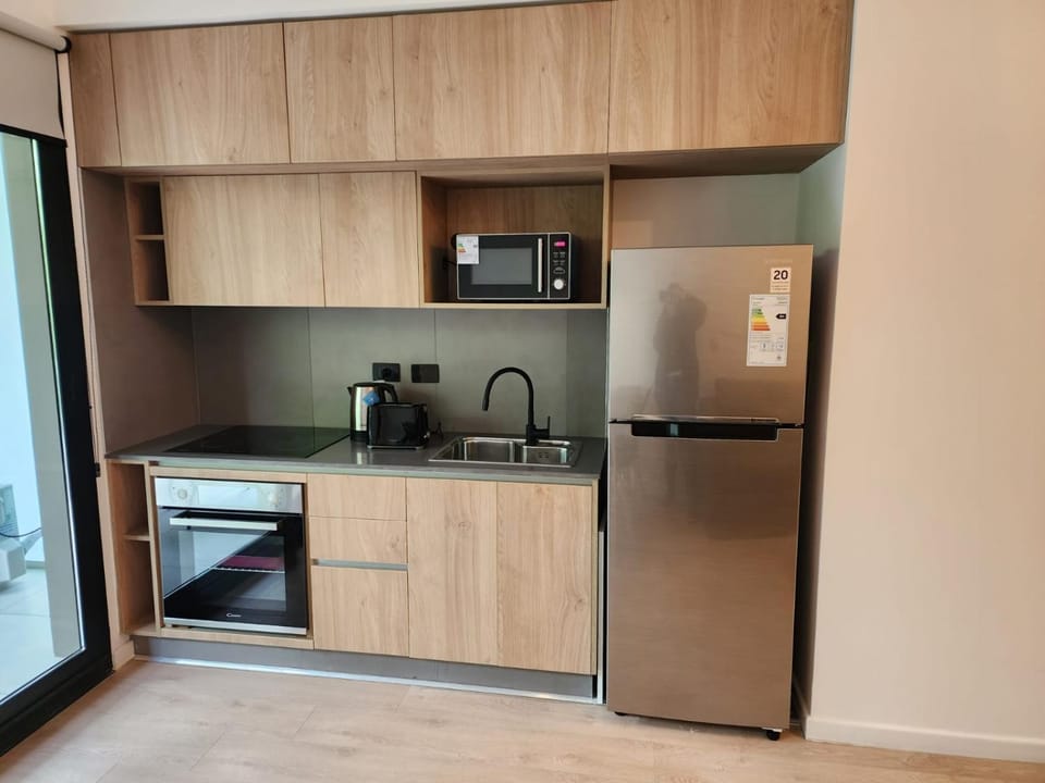 Kitchen or kitchenette, oven, stove