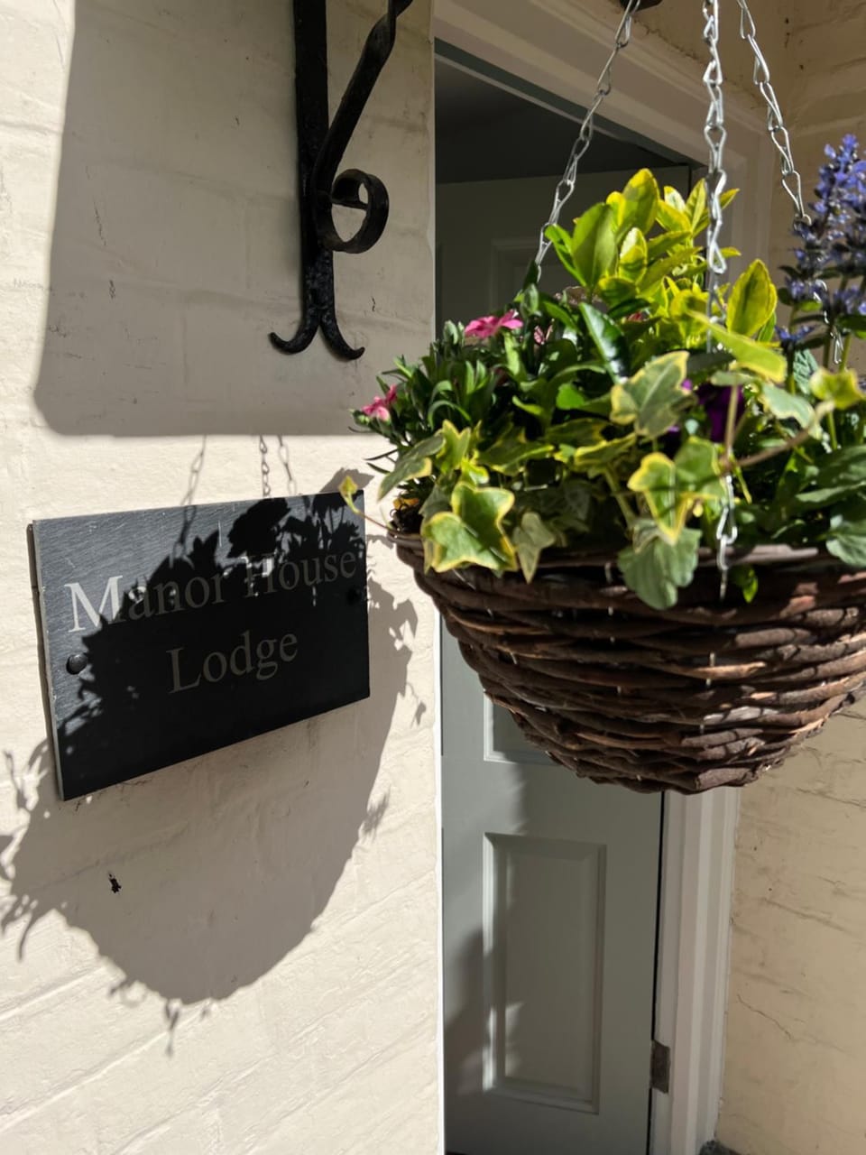 Property building, Facade/entrance, Day, Property logo or sign, Garden