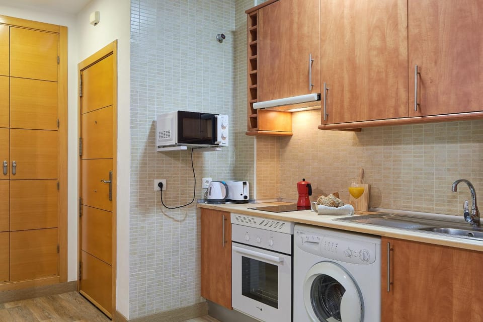 Kitchen or kitchenette, oven, stove, toaster