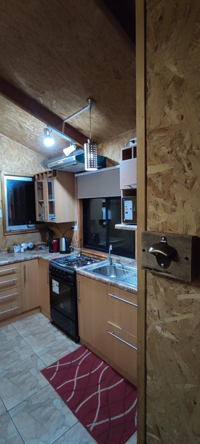 Kitchen or kitchenette, oven, stove