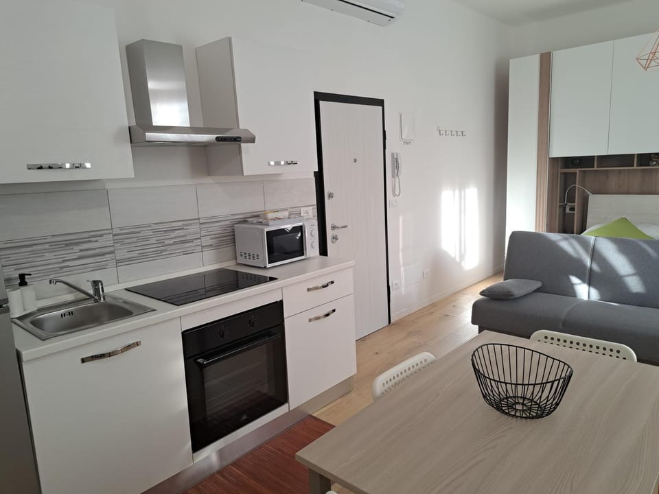 Kitchen or kitchenette, stove