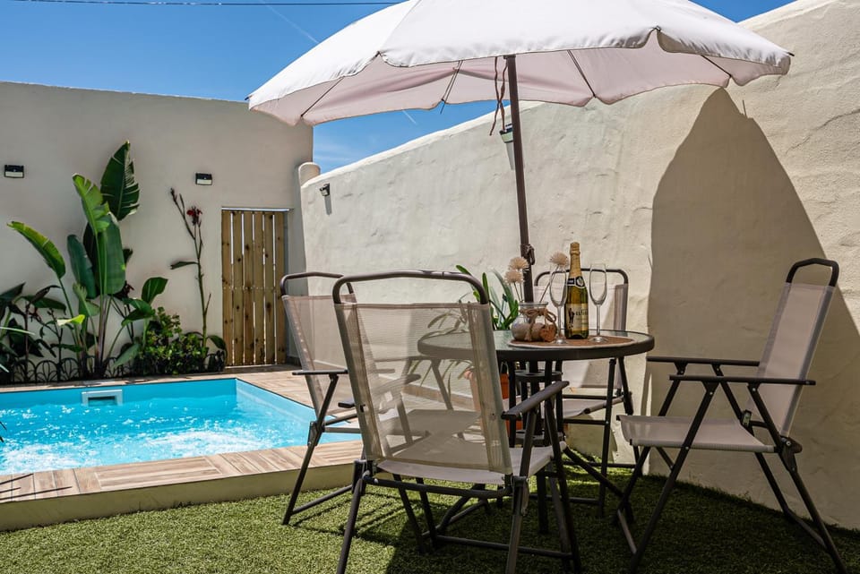 Property building, Living room, Swimming pool