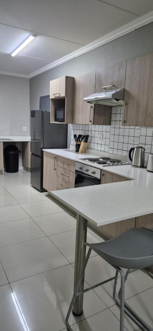 Kitchen or kitchenette, oven, stove