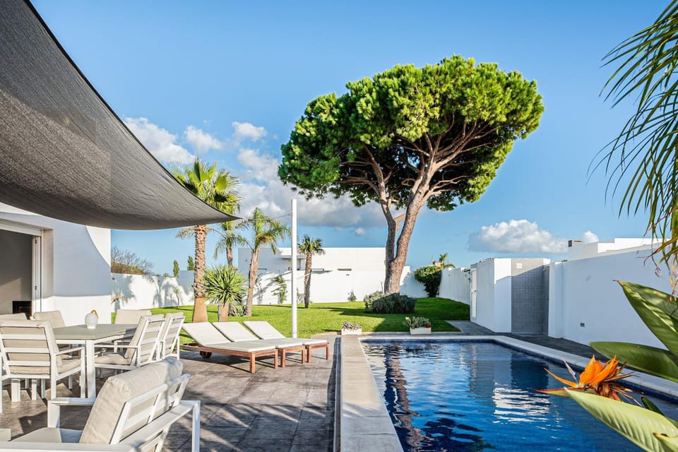 Property building, Living room, Swimming pool