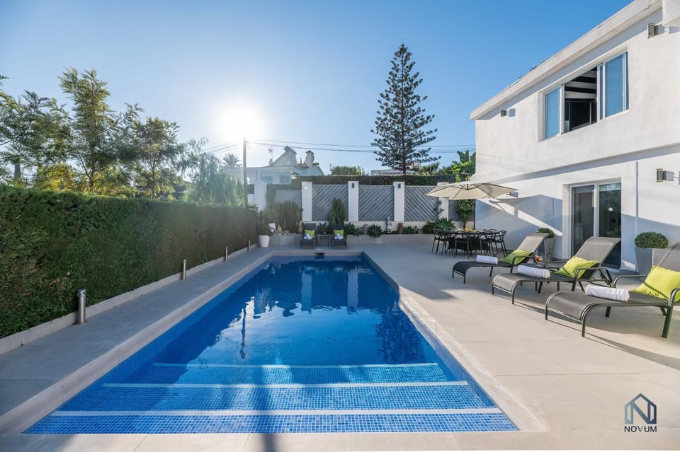 Property building, Pool view, Swimming pool, sunbed