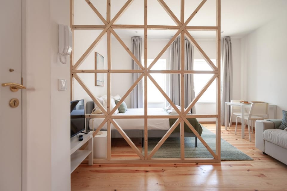 Bed, Living room, Seating area, Bedroom