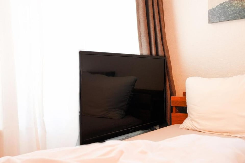 The Baron西新宿303セルフコーヒー付き Apartment in Shibuya