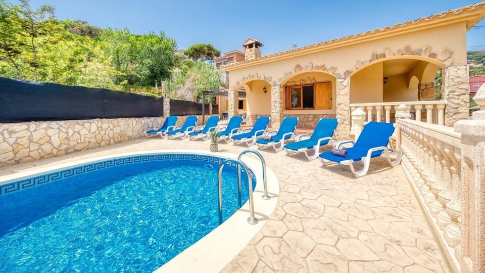 Property building, Living room, Swimming pool