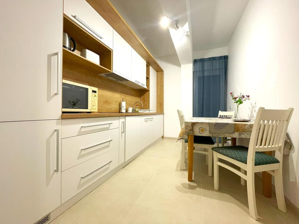 Dining area, microwave, toaster, kitchen