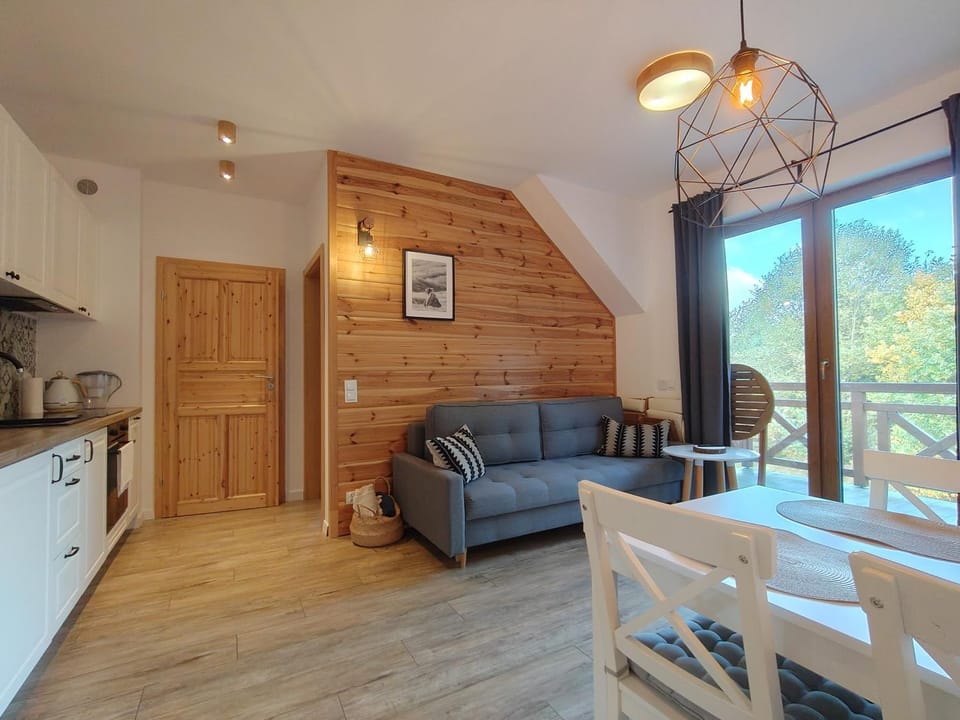 Kitchen or kitchenette, Living room, Seating area, Dining area