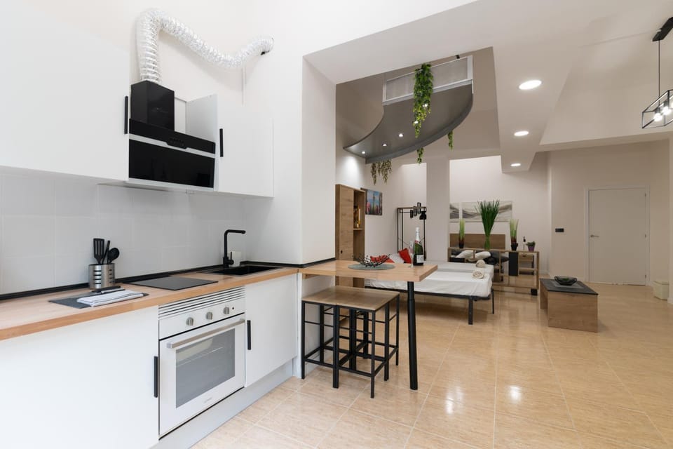 Bed, Kitchen or kitchenette, oven, stove, toaster, kitchen