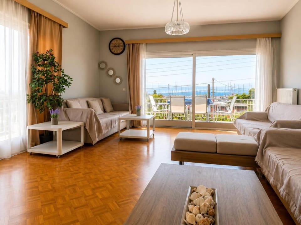 Natural landscape, View (from property/room), Living room, Seating area, Sea view