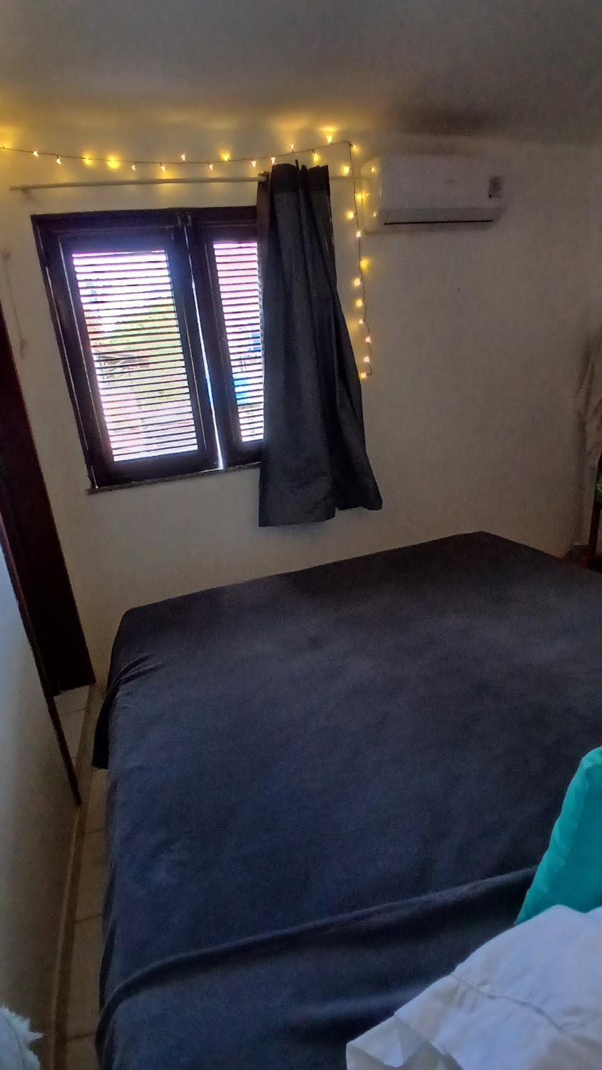 Photo of the whole room, air conditioner
