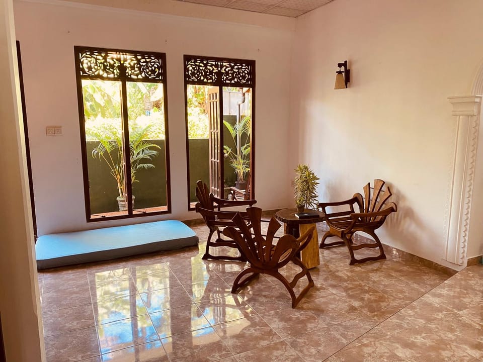 Property building, Living room, Seating area, Dining area