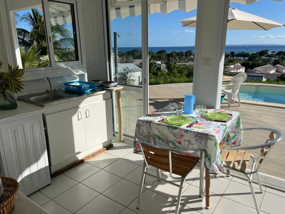 Dining area, Pool view, Sea view, Swimming pool, sunbed
