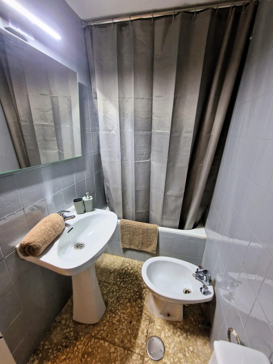 Bathroom, bidet, towels