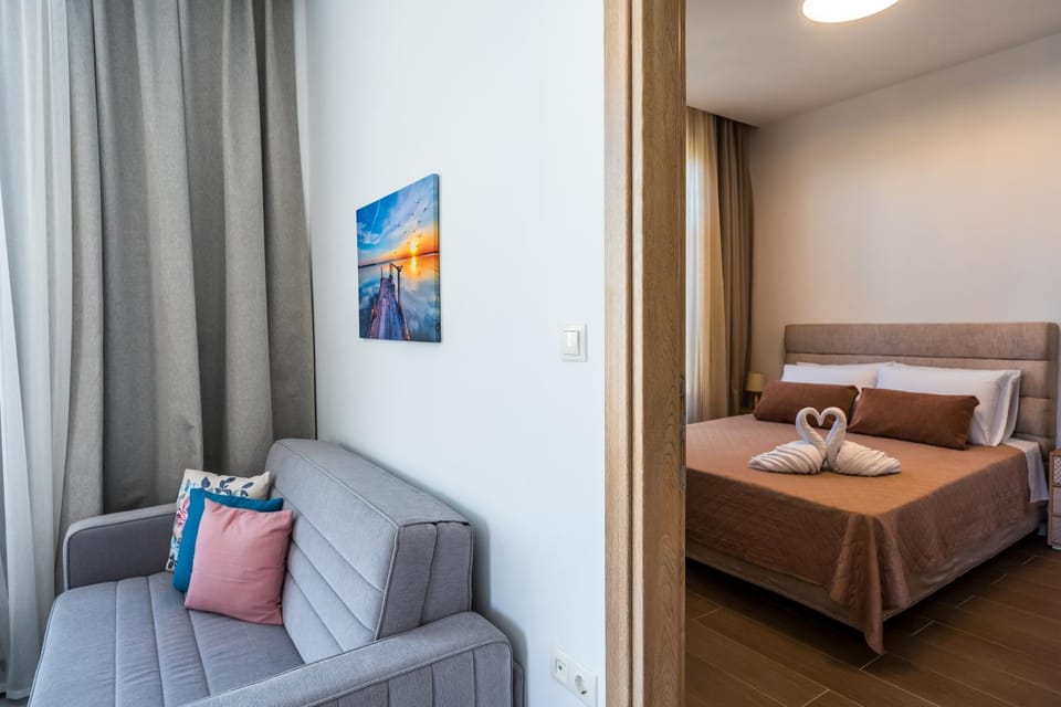 Bed, Living room, Seating area, Bedroom