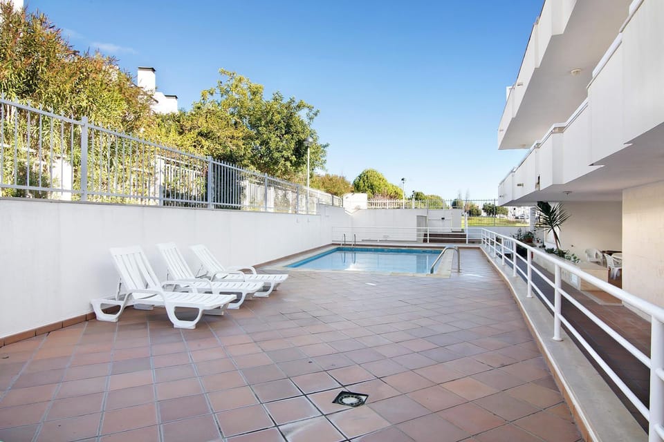 Property building, Living room, Swimming pool