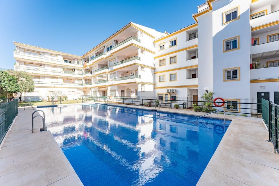 Property building, Living room, Swimming pool
