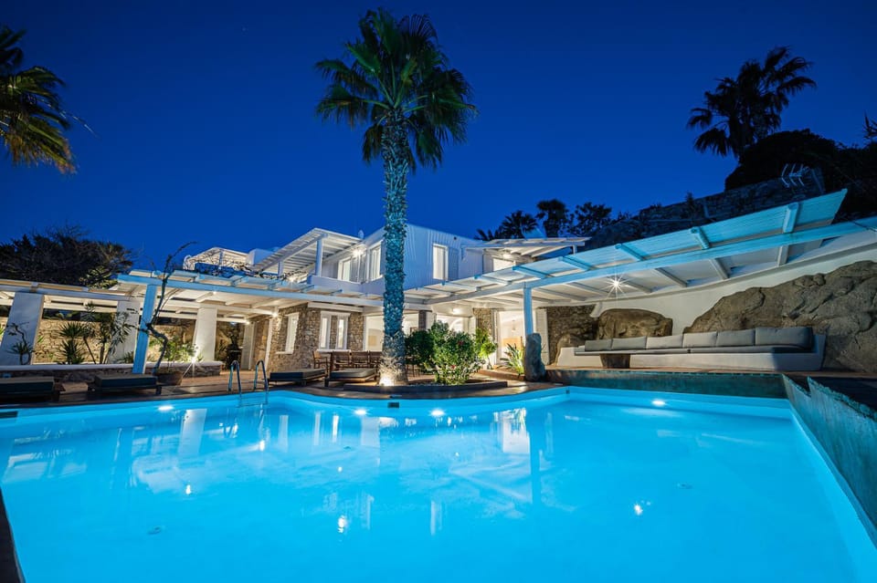 Property building, Night, Pool view, Swimming pool, sunbed