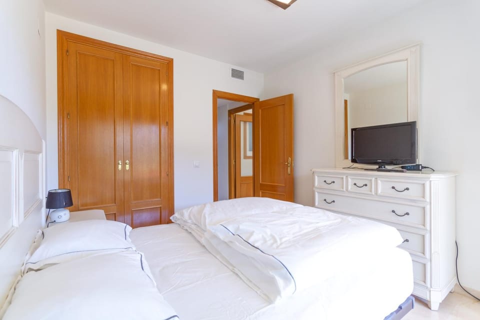 Bed, wardrobe