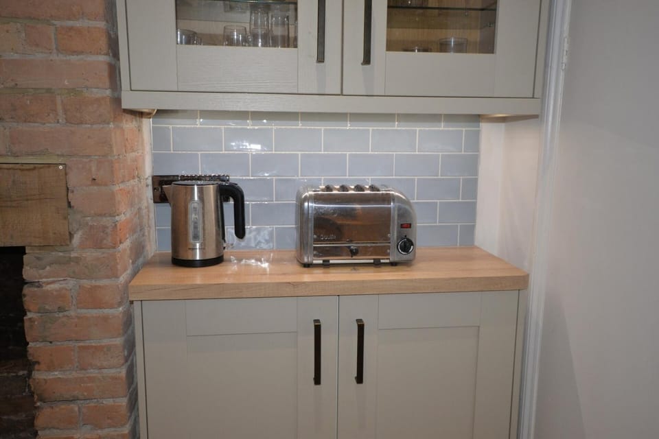 Kitchen or kitchenette, toaster