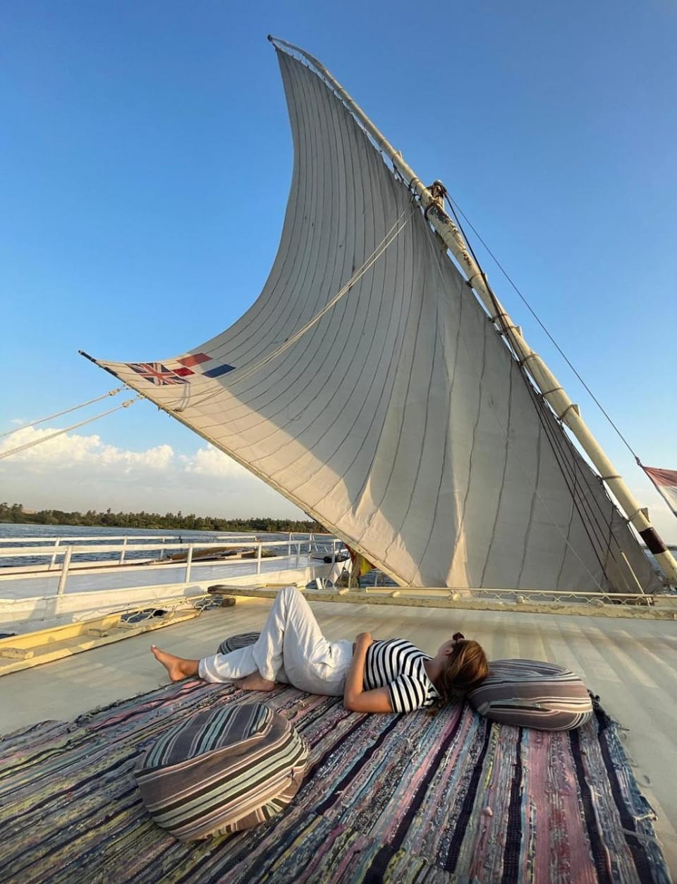 Aswan Felucca sailing boat and Hotel Docked boat in Red Sea Governorate