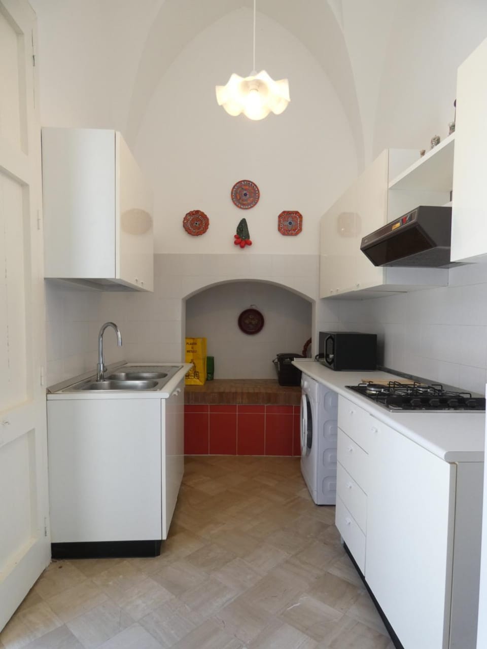 Kitchen or kitchenette, washing machine