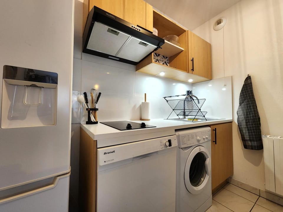 Kitchen or kitchenette, dishwasher, stove, washing machine, kitchen