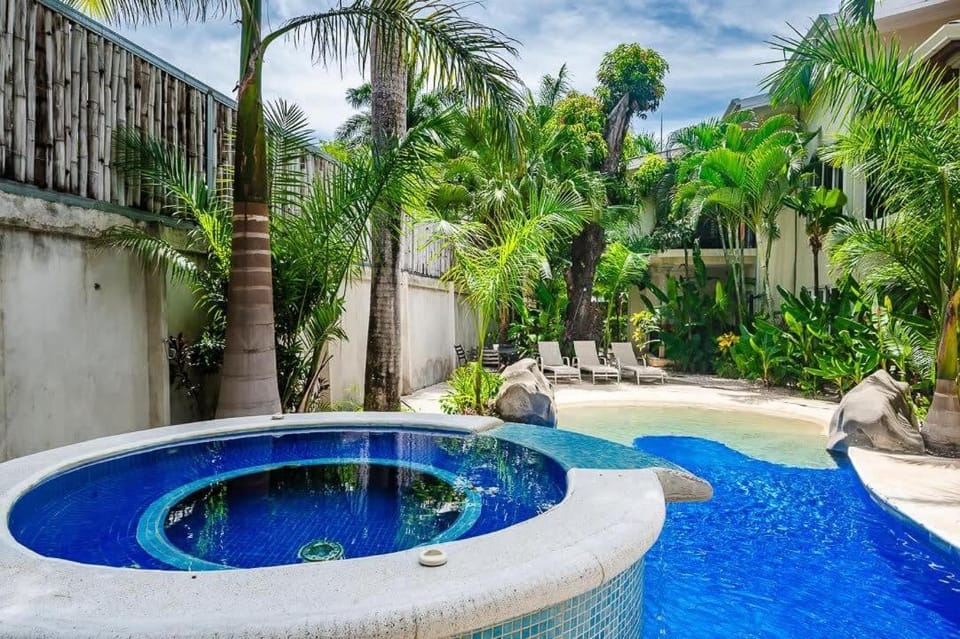 Trendy Renovated Condo with Private Patio, Shared Pool & Jacuzzi Near the Beach Apartment in Guanacaste Province