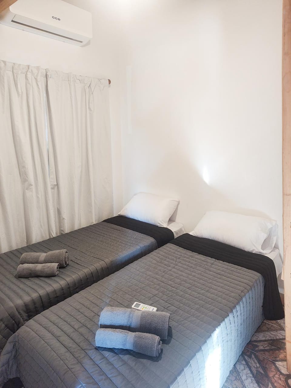 Bed, Photo of the whole room, Bedroom, towels, air conditioner